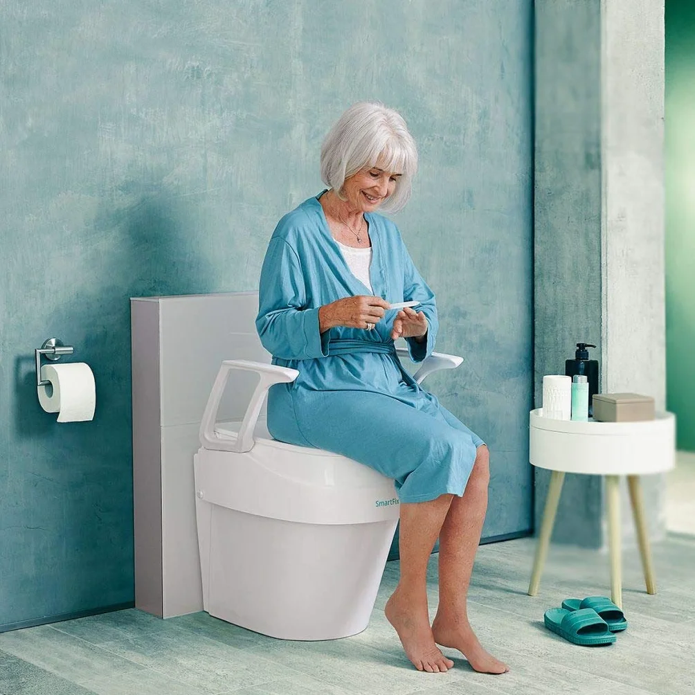 Dietz SmartFix 429112 podwyższona deska sedesowa z podłokietnikami, 3-stopniowa regulacja wysokości, biała, wyprodukowano w Niemczech HMV 33.40.01.1016